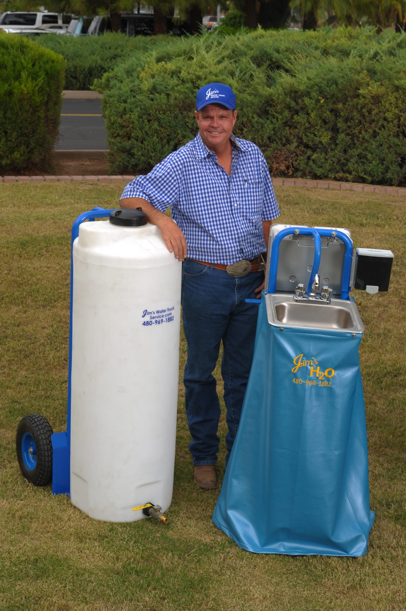 Man in front of tank